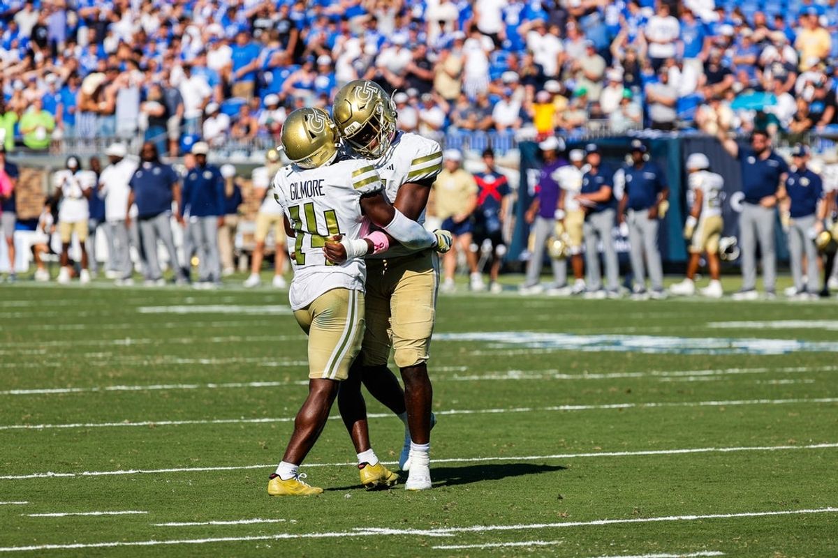 Oct 18, 2025; Durham, North Carolina, USA;  Georgia Tech Yellow Jackets linebacker Tah'J Butler (15) celebrates with  defensive back Jy Gilmore (14) during the second half of the game against Duke Blue Devils at Wallace Wade Stadium. Mandatory Credit: Jaylynn Nash-Imagn Images