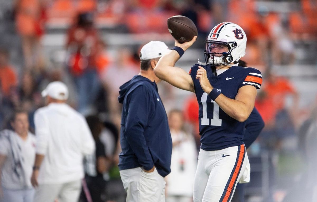 Auburn Tigers quarterback Jackson Arnold (11) warms up before Auburn Tigers take on Missouri Tigers at Jordan-Hare Stadium in Auburn, Ala. on Saturday, Oct. 18, 2025.