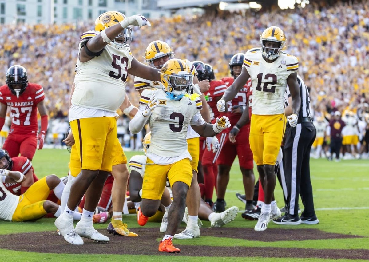 Oct 18, 2025; Tempe, Arizona, USA; Arizona State Sun Devils running back Raleek Brown (3) celebrates with offensive lineman Josh Atkins (53) and wide receiver Malik McClain (12) after scoring a touchdown against the Texas Tech Red Raiders in the fourth quarter at Mountain America Stadium. Mandatory Credit: Mark J. Rebilas-Imagn Images