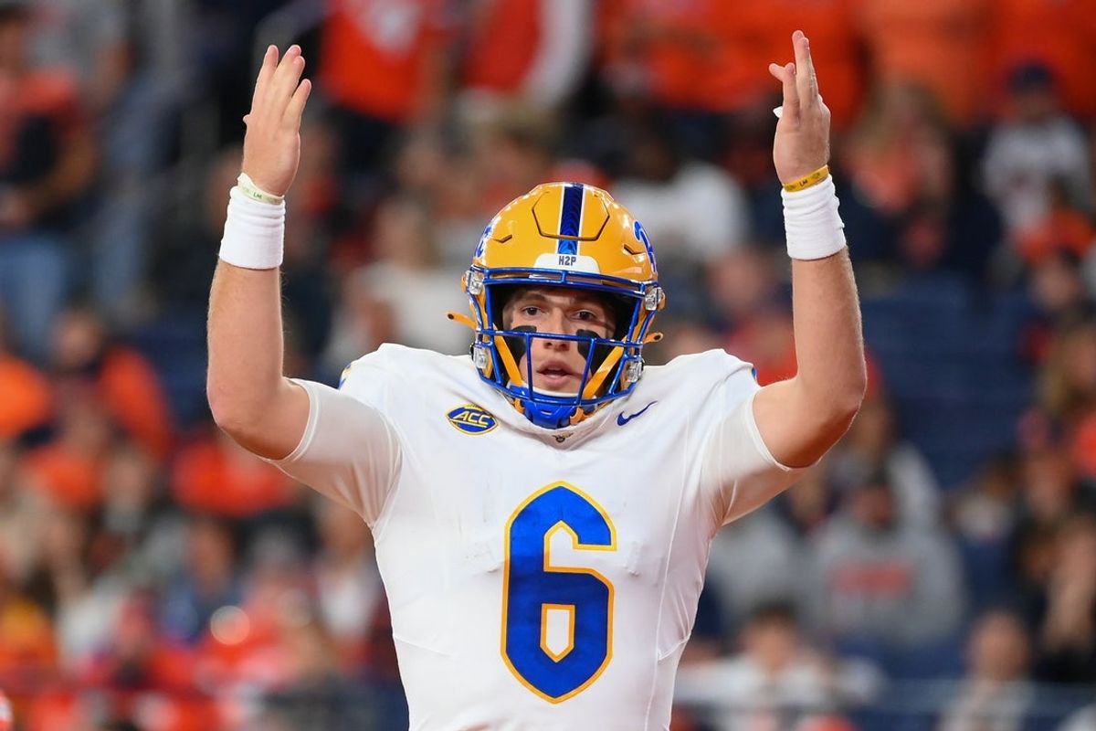 Oct 18, 2025; Syracuse, New York, USA; Pittsburgh Panthers quarterback Mason Heintschel (6) reacts to his touchdown run against the Syracuse Orange during the first half at the JMA Wireless Dome. Mandatory Credit: Rich Barnes-Imagn Images