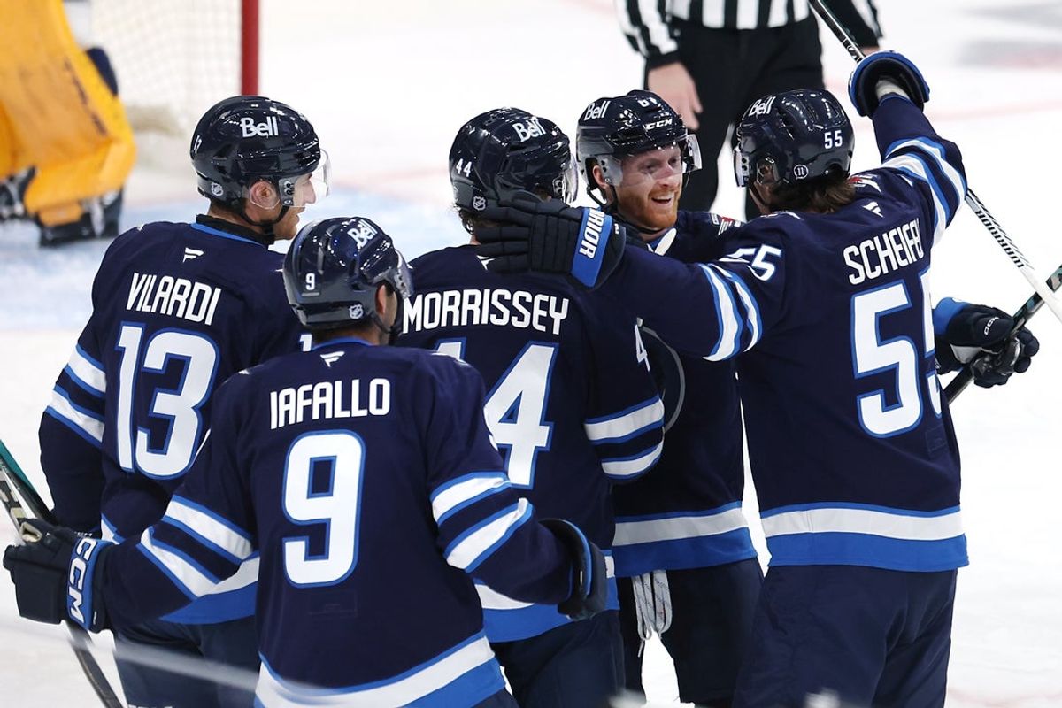 Oct 18, 2025; Winnipeg, Manitoba, CAN; Winnipeg Jets center Mark Scheifele (55) celebrates his goal against the Nashville Predators in the first period at Canada Life Centre. Mandatory Credit: James Carey Lauder-Imagn Images