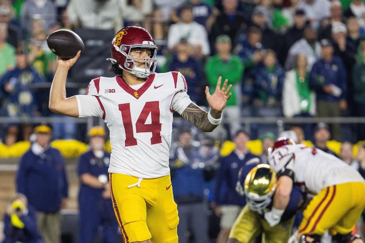 Oct 18, 2025; South Bend, Indiana, USA;  Southern California Trojans quarterback Jayden Maiava (14) drops back to throw the ball in the first half against the Notre Dame Fighting Irish at Notre Dame Stadium. Mandatory Credit: Trevor Ruszkowski-Imagn Images