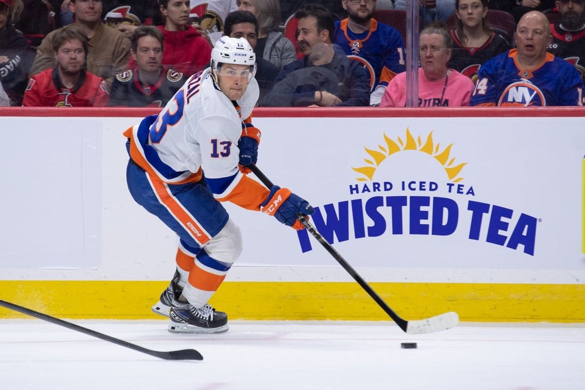 Oct 18, 2025; Ottawa, Ontario, CAN; New York Islanders center Matthew Barzal (13) skates with the puck in the second period against the Ottawa Senators at the Canadian Tire Centre. Mandatory Credit: Marc DesRosiers-IMAGN Images