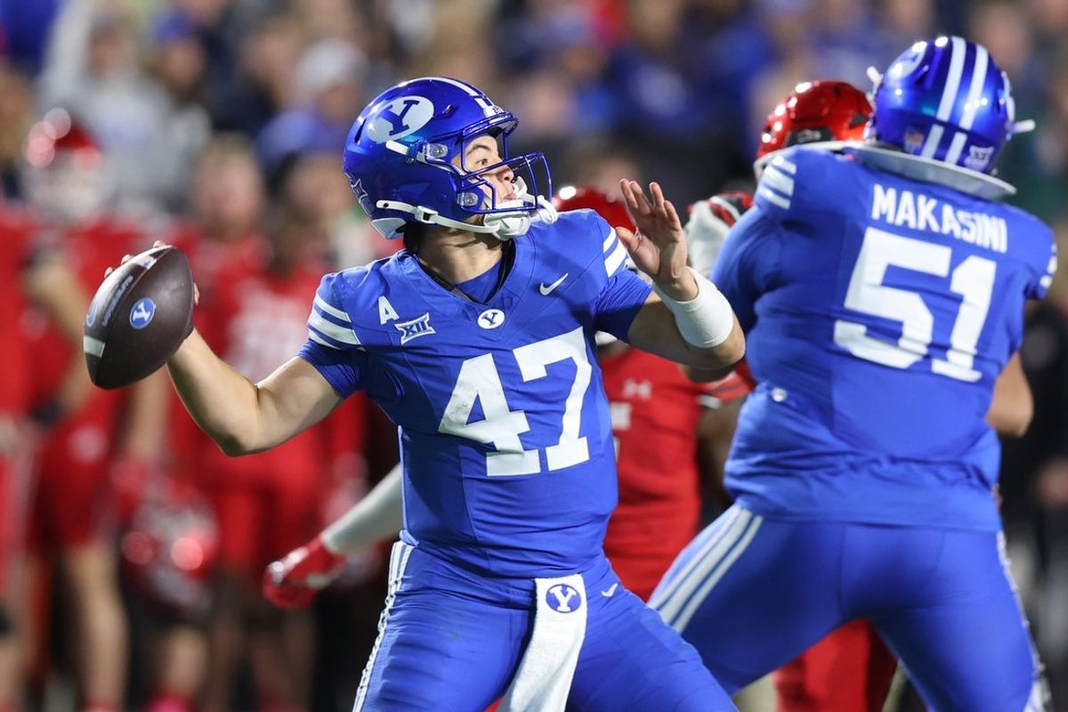 Oct 18, 2025; Provo, Utah, USA; BYU Cougars quarterback Bear Bachmeier (47) throws the ball against the Utah Utes during the second quarter at LaVell Edwards Stadium. Mandatory Credit: Rob Gray-Imagn Images
