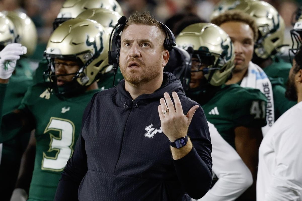 Oct 18, 2025; Tampa, Florida, USA;  South Florida Bulls head coach Alex Golesh reacts to a replay during the second quarter against the Florida Atlantic Owls at Raymond James Stadium. Mandatory Credit: Reinhold Matay-Imagn Images