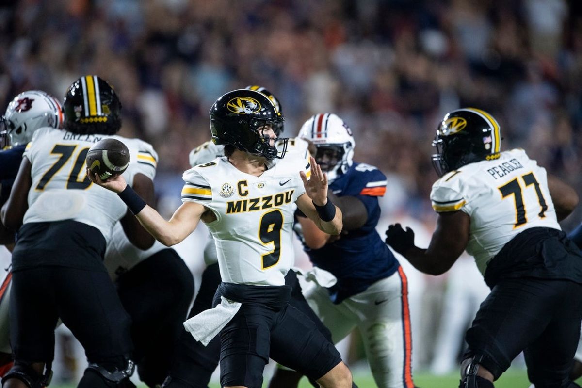 Missouri Tigers quarterback Beau Pribula (9) throws the ball as Auburn Tigers take on Missouri Tigers at Jordan-Hare Stadium in Auburn, Ala. on Saturday, Oct. 18, 2025. Missouri Tigers lead Auburn Tigers 10-7 at halftime.
