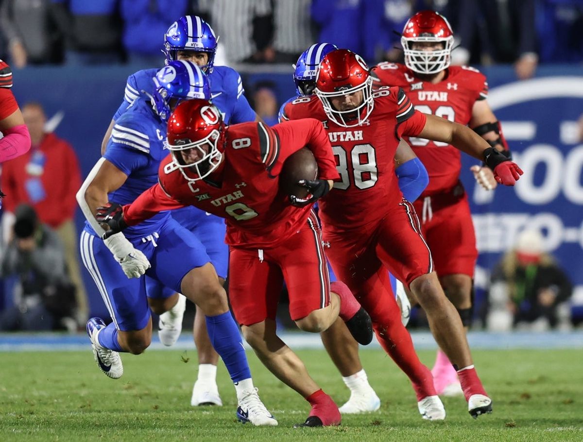 Oct 18, 2025; Provo, Utah, USA; Utah Utes linebacker Lander Barton (8) runs after a catch against the BYU Cougars during the second quarter at LaVell Edwards Stadium. Mandatory Credit: Rob Gray-Imagn Images