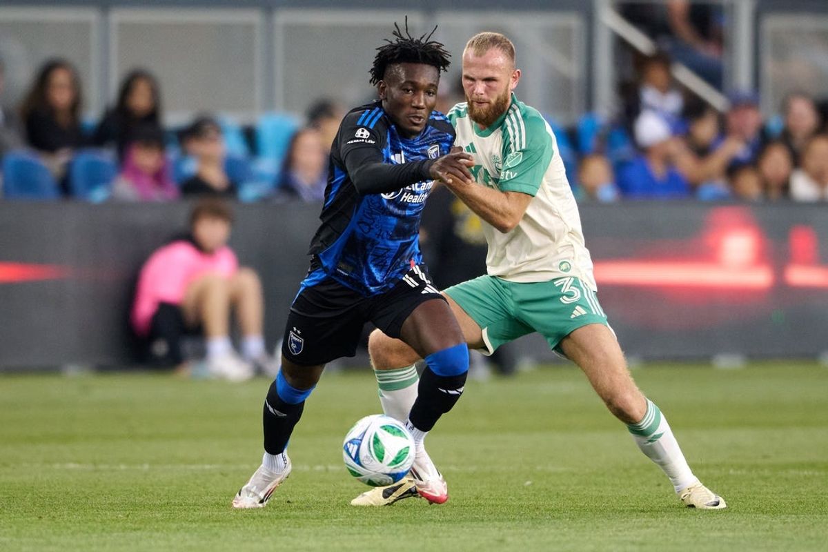 Oct 18, 2025; San Jose, California, USA; San Jose Earthquakes forward Ousseni Bouda (11) plays the ball against Austin FC defender Mikkel Desler (3) during the first half at PayPal Park. Mandatory Credit: Robert Edwards-Imagn Images
