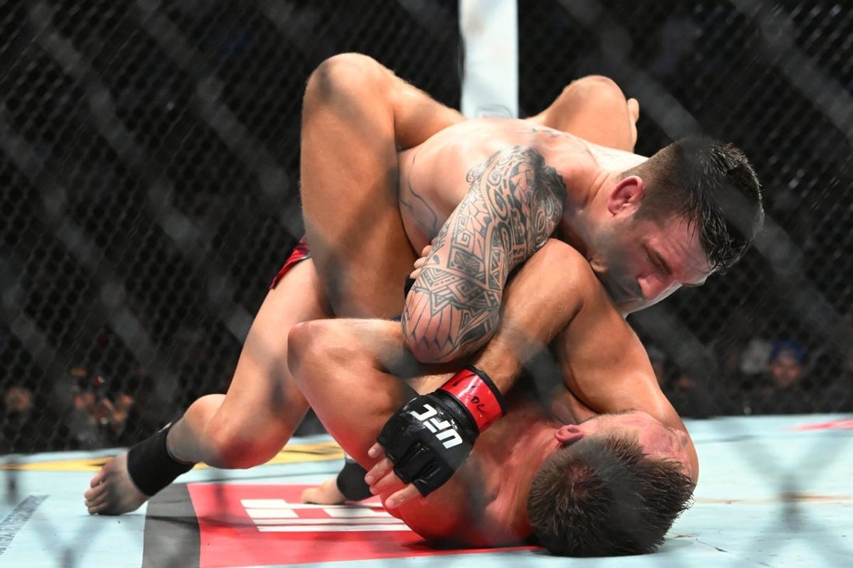 Oct 18, 2025; Vancouver, BC, CANADA; Reinier De Ridder (red gloves) fights Brendan Allen (blue gloves) during UFC Fight Night at Rogers Arena. Mandatory Credit: Simon Fearn-Imagn Images