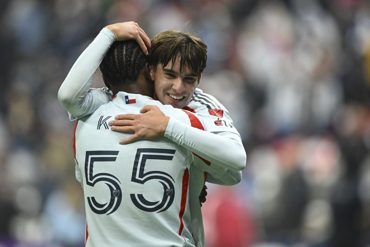 Oct 18, 2025; Vancouver, British Columbia, CAN;  FC Dallas defender Josh Torquato (24) celebrates the win with midfielder Kaick (55) against Vancouver Whitecaps FC at BC Place. Mandatory Credit: Anne-Marie Sorvin-Imagn Images