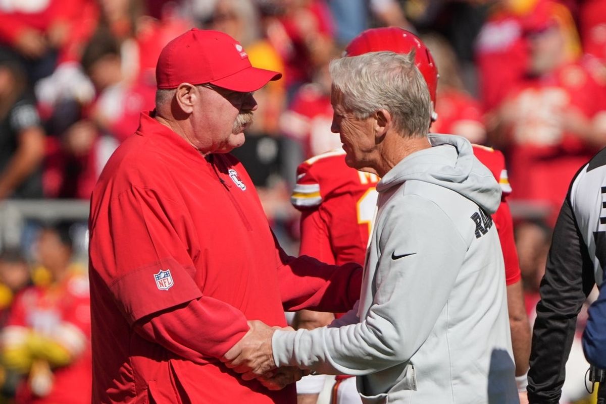Oct 19, 2025; Kansas City, Missouri, USA; Kansas City Chiefs head coach Andy Reid shakes hands with Las Vegas Raiders head coach Pete Carroll during warmups prior to the game at GEHA Field at Arrowhead Stadium. Mandatory Credit: Denny Medley-Imagn Images