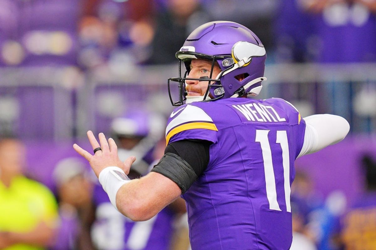 Oct 19, 2025; Minneapolis, Minnesota, USA; Minnesota Vikings quarterback Carson Wentz (11) warms up before the game against the Philadelphia Eagles at U.S. Bank Stadium. Mandatory Credit: Brad Rempel-Imagn Images
