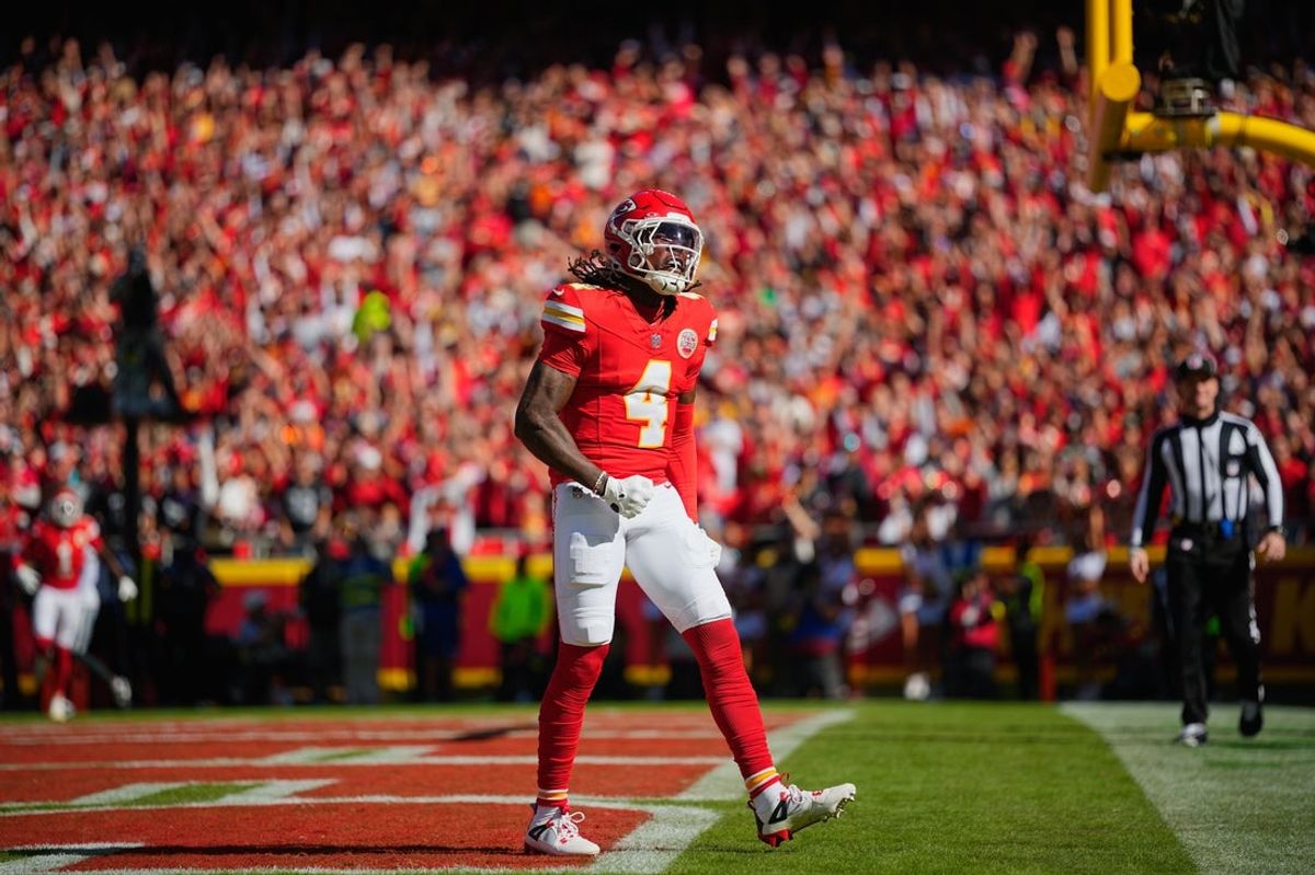 Oct 19, 2025; Kansas City, Missouri, USA; Kansas City Chiefs wide receiver Rashee Rice (4) celebrates after scoring a touchdown against the Las Vegas Raiders during the first quarter of the game at GEHA Field at Arrowhead Stadium. Mandatory Credit: Jay Biggerstaff-Imagn Images