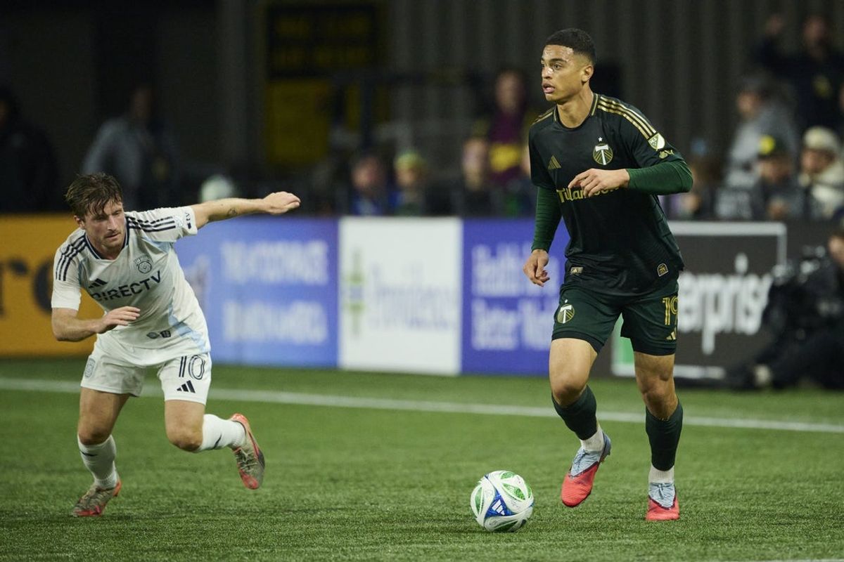 Oct 18, 2025; Portland, Oregon, USA; Portland Timbers forward Kevin Kelsy (19) controls the ball during the first half against San Diego FC midfielder Anders Dreyer (10) at Providence Park. Mandatory Credit: Troy Wayrynen-Imagn Images