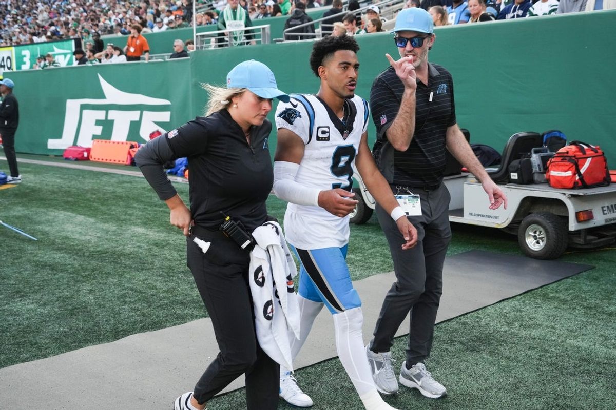 Oct 19, 2025; East Rutherford, New Jersey, USA; Carolina Panthers quarterback Bryce Young (9) exits the field during the third quarter against the New York Jets at MetLife Stadium. Mandatory Credit: Robert Deutsch-Imagn Images