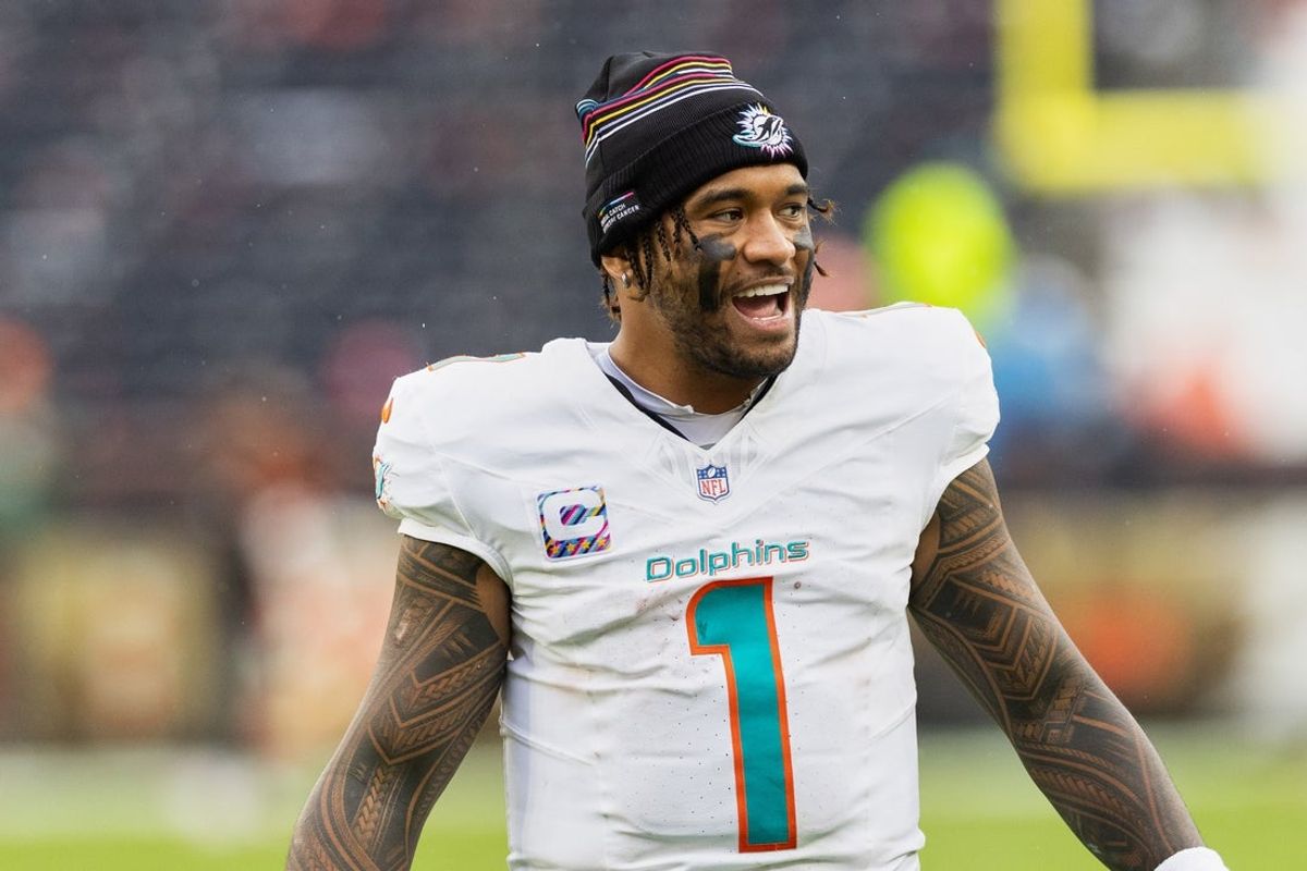 Oct 19, 2025; Cleveland, Ohio, USA; Miami Dolphins quarterback Tua Tagovailoa (1) reacts while walking off the field after the game against the Cleveland Browns at Huntington Bank Field. Mandatory Credit: Scott Galvin-Imagn Images