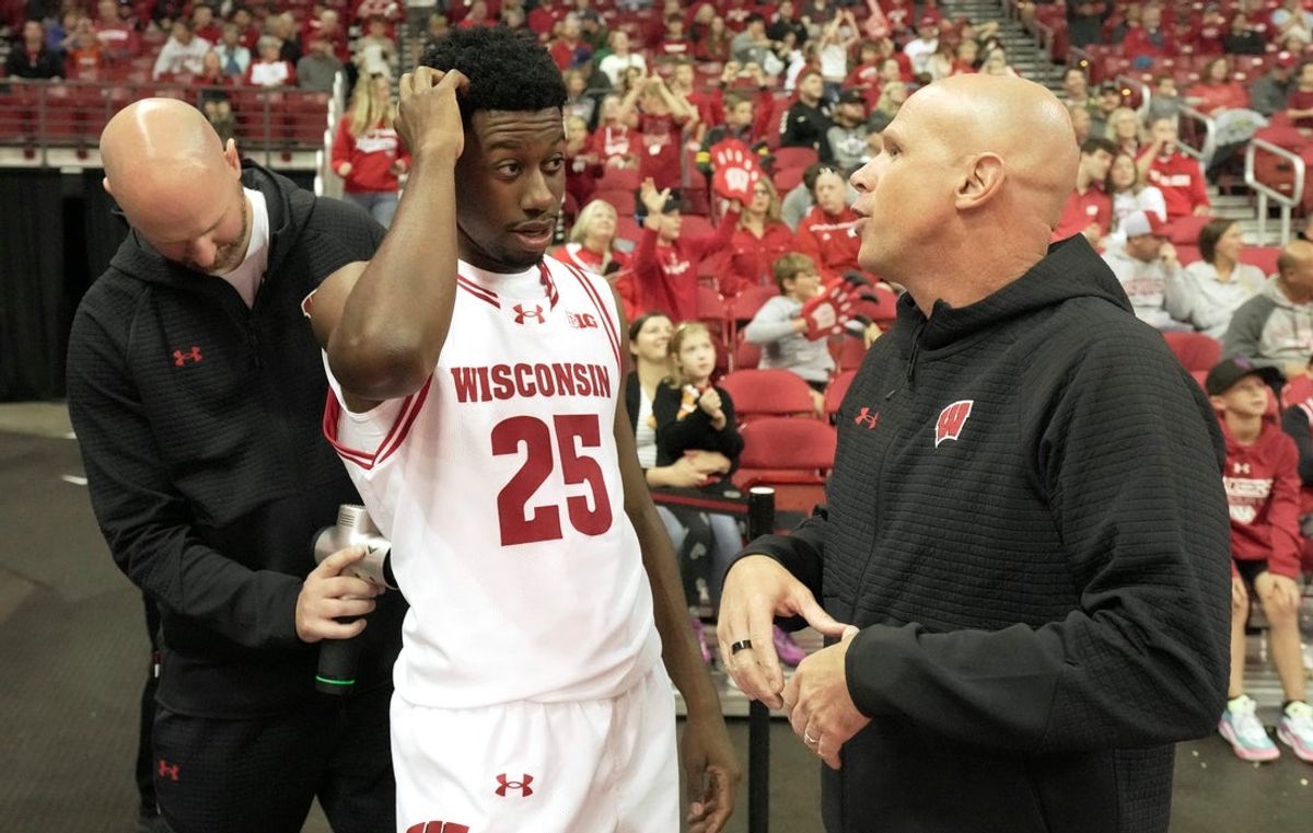 John Blackwell (24) talks with assistant coach Lance Randall during a Wisconsin men’s basketball scrimmage Sunday, October 19, 2025 at the Kohl Center in Madison, Wisconsin.