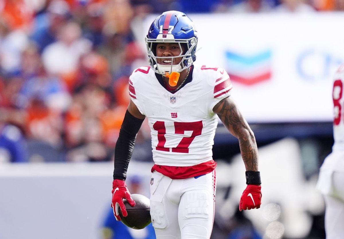 Oct 19, 2025; Denver, Colorado, USA; New York Giants wide receiver Wan'Dale Robinson (17) reacts after a play during the second half against the Denver Broncos at Empower Field at Mile High. Mandatory Credit: Ron Chenoy-Imagn Images