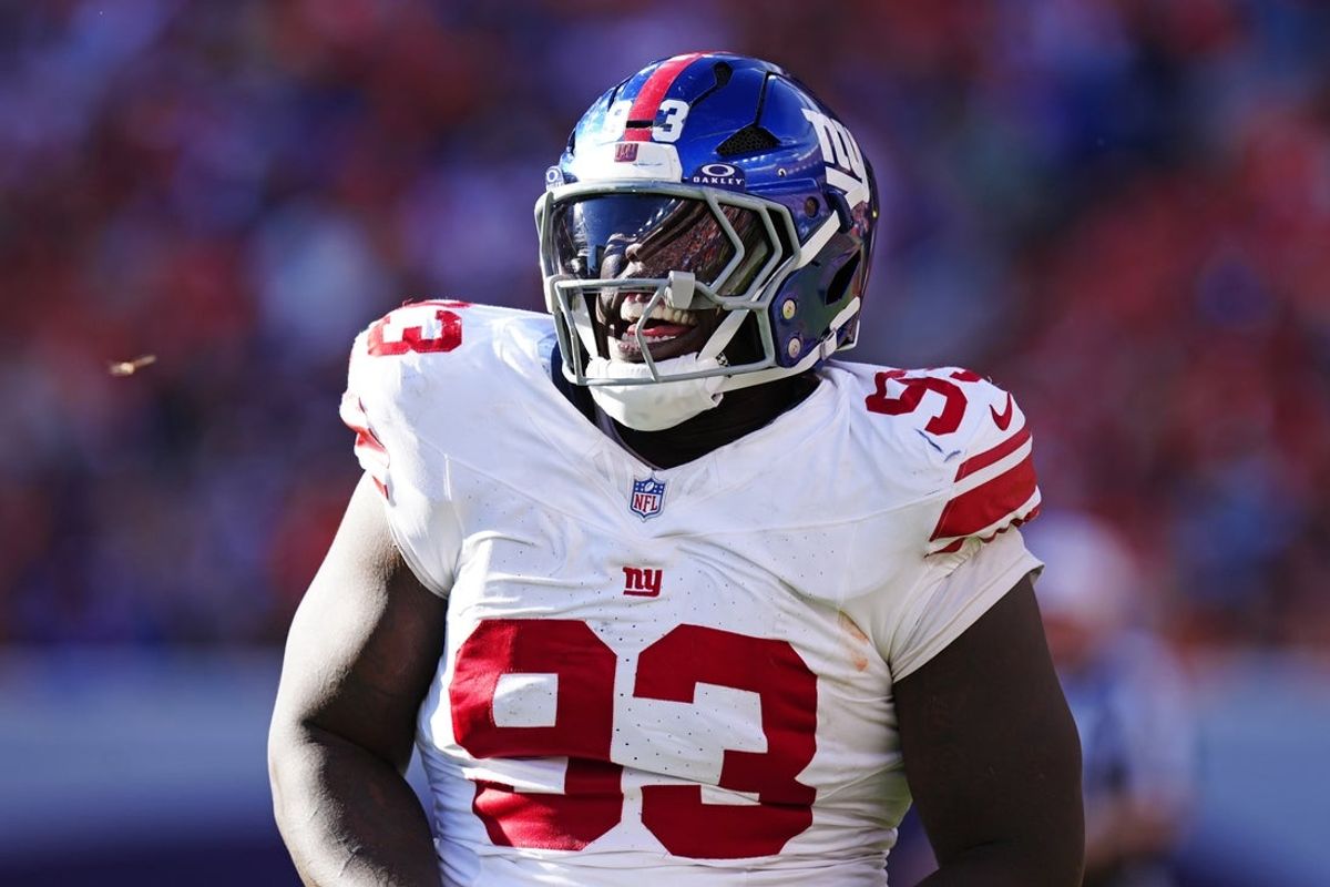 Oct 19, 2025; Denver, Colorado, USA; New York Giants defensive tackle Rakeem Nunez-Roches (93) reacts after a play during the second half against the Denver Broncos at Empower Field at Mile High. Mandatory Credit: Ron Chenoy-Imagn Images