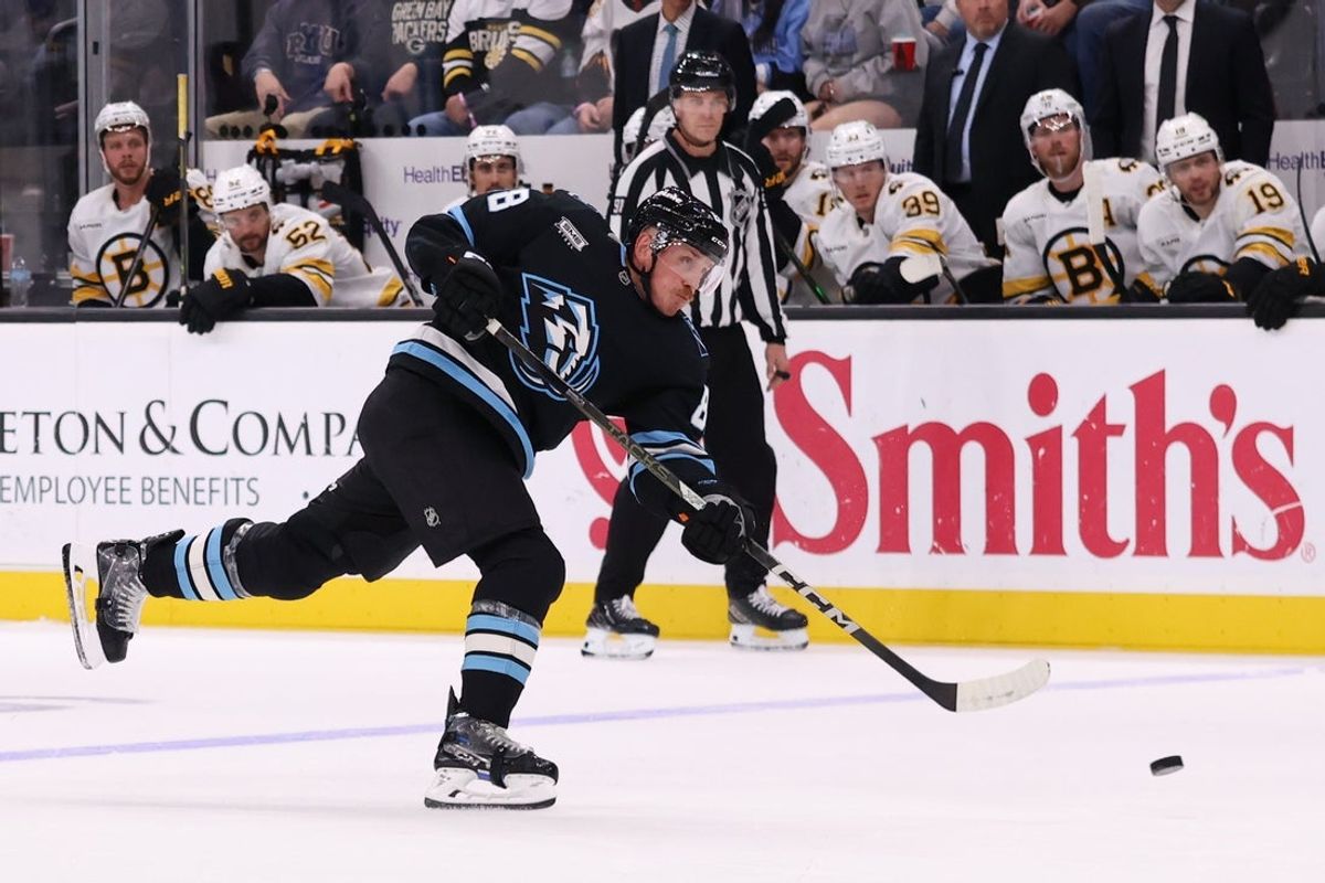 Oct 19, 2025; Salt Lake City, Utah, USA; Utah Mammoth center Nick Schmaltz (8) takes a shot against the Boston Bruins during the third period at Delta Center. Mandatory Credit: Rob Gray-Imagn Images