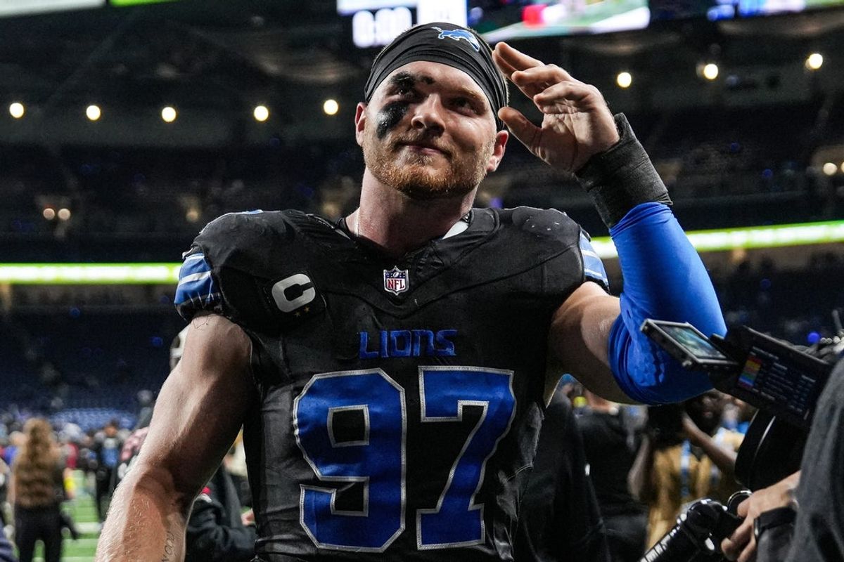 Detroit Lions defensive end Aidan Hutchinson (97) waves at fans after 24-9 win over Tampa Bay Buccaneers at Ford Field in Detroit on Monday, Oct. 20, 2025.