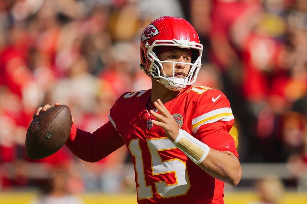 Oct 19, 2025; Kansas City, Missouri, USA; Kansas City Chiefs quarterback Patrick Mahomes (15) throws a pass during the first half against the Las Vegas Raiders at GEHA Field at Arrowhead Stadium. Mandatory Credit: Jay Biggerstaff-Imagn Images