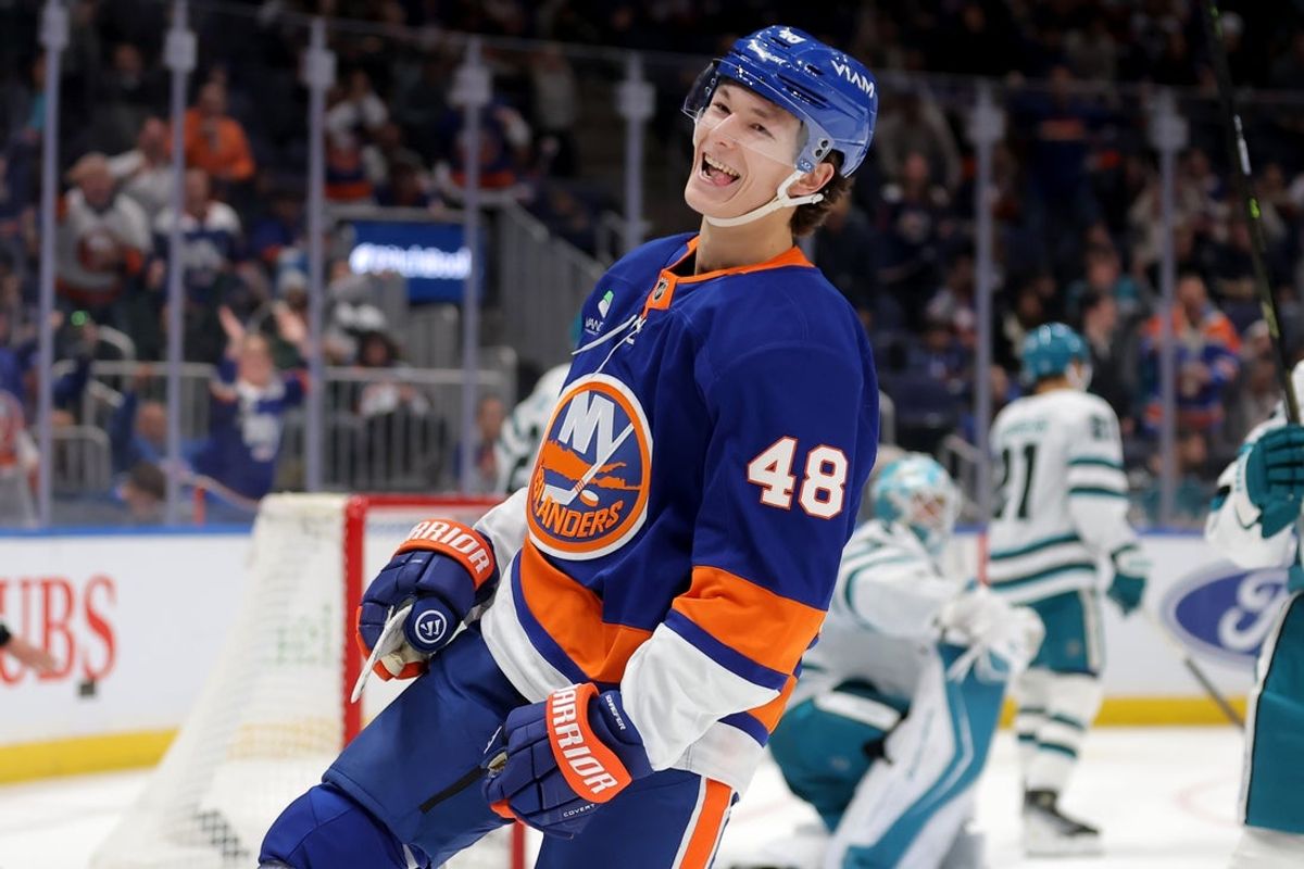 Oct 21, 2025; Elmont, New York, USA; New York Islanders defenseman Matthew Schaefer (48) celebrates his goal against San Jose Sharks goaltender Yaroslav Askarov (30) during the second period at UBS Arena. Mandatory Credit: Brad Penner-Imagn Images