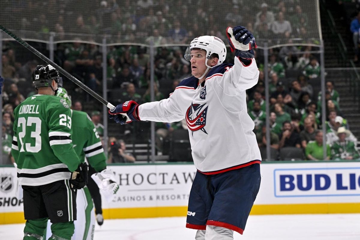 Oct 21, 2025; Dallas, Texas, USA; Columbus Blue Jackets left wing Dmitri Voronkov (10) celebrates after scoring a power play goal against the Dallas Stars during the third period at the American Airlines Center. Mandatory Credit: Jerome Miron-Imagn Images