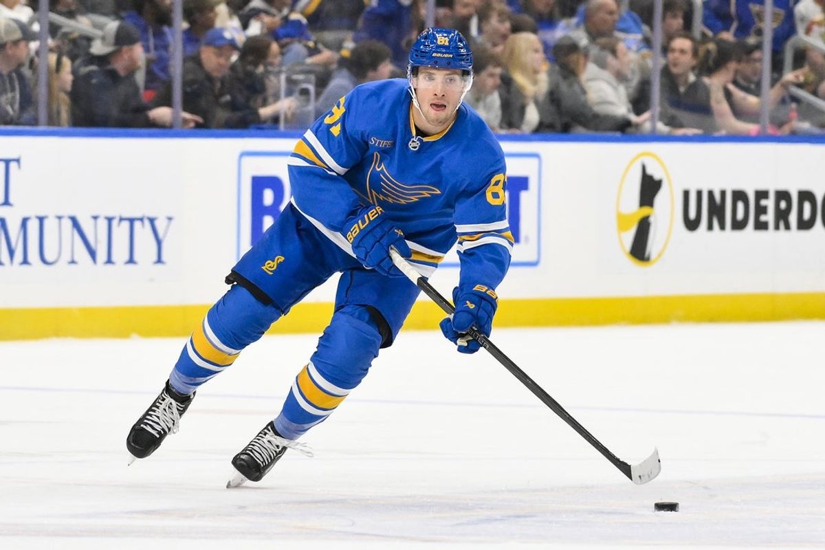 Oct 21, 2025; St. Louis, Missouri, USA; St. Louis Blues left wing Dylan Holloway (81) controls the puck against the Los Angeles Kings during the second period at Enterprise Center. Mandatory Credit: Jeff Curry-Imagn Images