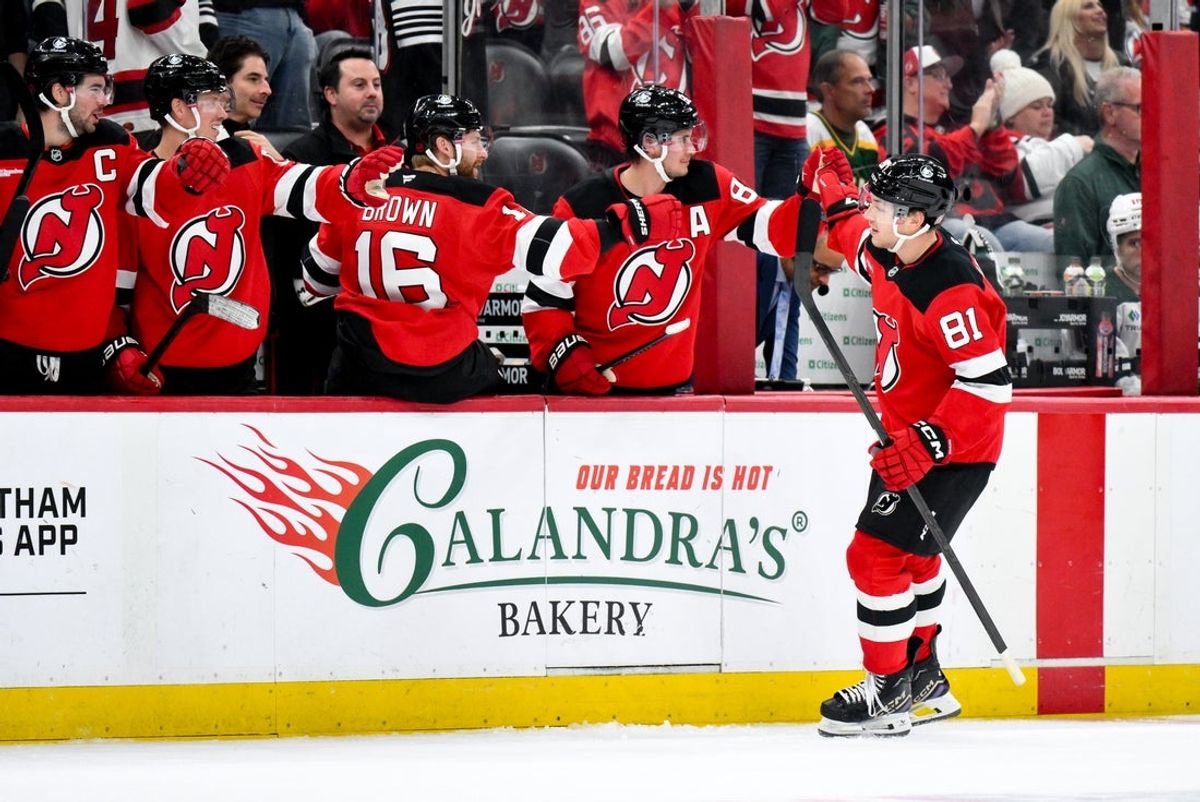Oct 22, 2025; Newark, New Jersey, USA; New Jersey Devils right wing Arseny Gritsyuk (81) celebrates with teammates after scoring a goal against the Minnesota Wild during the third period at Prudential Center. Mandatory Credit: John Jones-Imagn Images