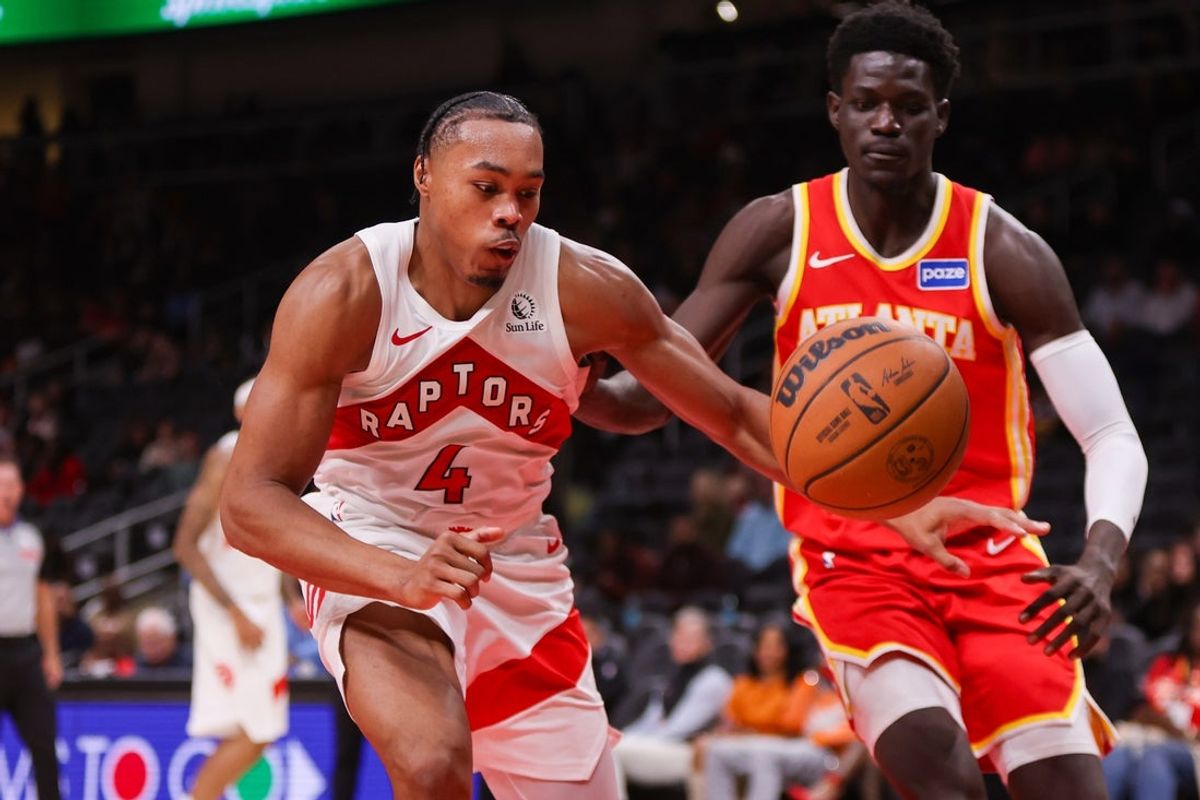 Oct 22, 2025; Atlanta, Georgia, USA; Toronto Raptors forward Scottie Barnes (4) reaches for a loose ball against the Atlanta Hawks in the fourth quarter at State Farm Arena. Mandatory Credit: Brett Davis-Imagn Images
