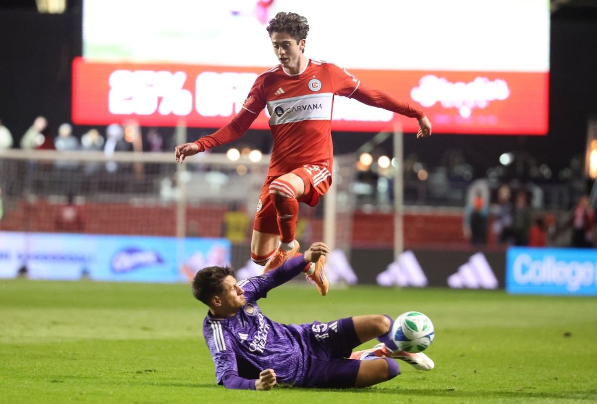 Oct 22, 2025; Bridgeview, Illinois, USA; Chicago Fire FC midfielder Brian Gutierrez (17) and Orlando City midfielder Cesar Araujo (5) battle for control of the ball during the second half at SeatGeek Stadium. Mandatory Credit: Talia Sprague-Imagn Images