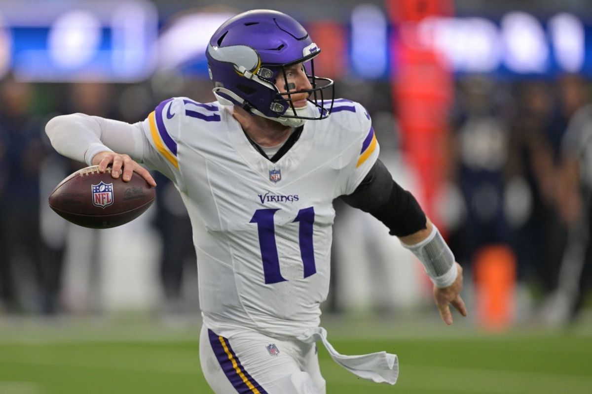 Oct 23, 2025; Inglewood, California, USA;Minnesota Vikings quarterback Carson Wentz (11) drops back to pass against the Los Angeles Chargers during the first half at SoFi Stadium. Mandatory Credit: Jayne Kamin-Oncea-Imagn Images