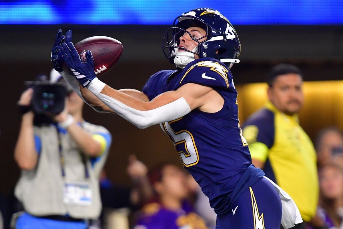 Oct 23, 2025; Inglewood, California, USA; Los Angeles Chargers wide receiver Ladd McConkey (15) makes a touchdown catch against the Minnesota Vikings during the first half at SoFi Stadium. Mandatory Credit: Gary A. Vasquez-Imagn Images