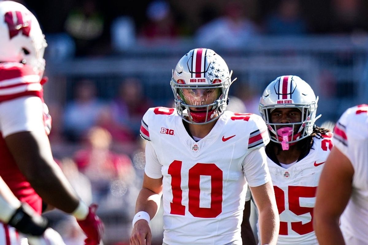 Ohio State Buckeyes quarterback Julian Sayin (10) prepares to put the ball in play during the game against the Wisconsin Badgers at Camp Randall Stadium on Saturday, Oct. 18, 2025 in Madison, Wisconsin.