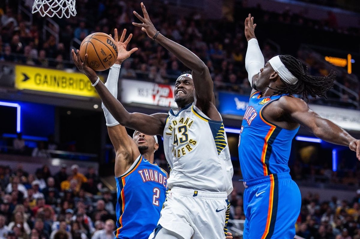 Oct 23, 2025; Indianapolis, Indiana, USA;  Indiana Pacers forward Pascal Siakam (43) shoots the ball while Oklahoma City Thunder guard Luguentz Dort (5) and guard Shai Gilgeous-Alexander (2) defend in the second half at Gainbridge Fieldhouse. Mandatory Credit: Trevor Ruszkowski-Imagn Images