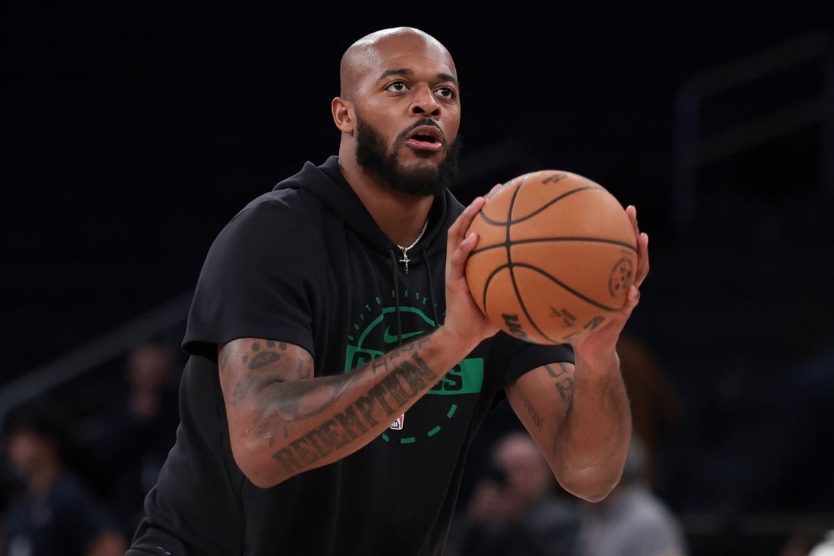 Oct 24, 2025; New York, New York, USA; Boston Celtics forward Xavier Tillman (26) warms up before the game against the New York Knicks at Madison Square Garden. Mandatory Credit: Vincent Carchietta-Imagn Images