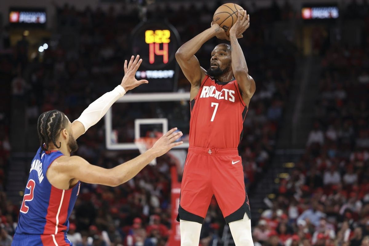 Oct 24, 2025; Houston, Texas, USA; Houston Rockets forward Kevin Durant (7) shoots the ball as Detroit Pistons guard Cade Cunningham (2) defends during the first quarter at Toyota Center. Mandatory Credit: Troy Taormina-Imagn Images