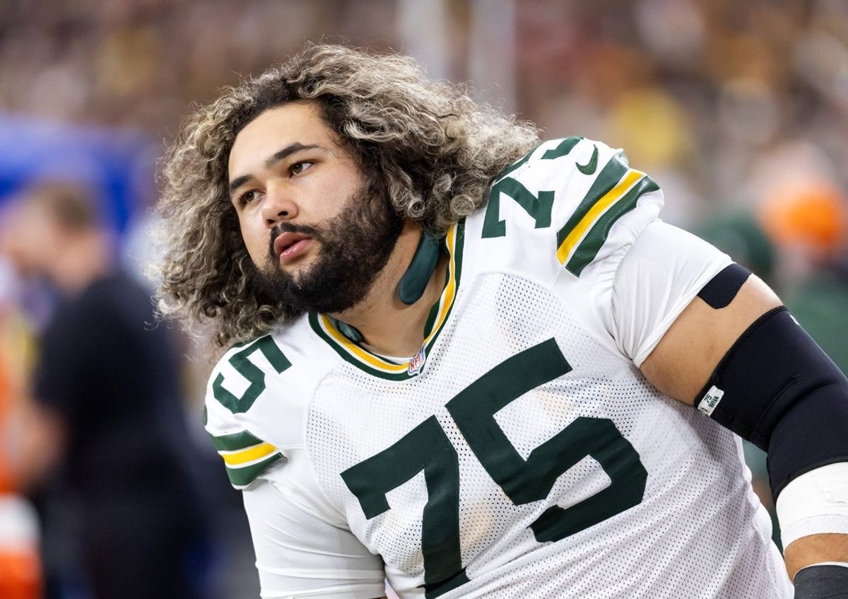 Oct 19, 2025; Glendale, Arizona, USA; Green Bay Packers guard Sean Rhyan (75) against the Arizona Cardinals at State Farm Stadium. Mandatory Credit: Mark J. Rebilas-Imagn Images
