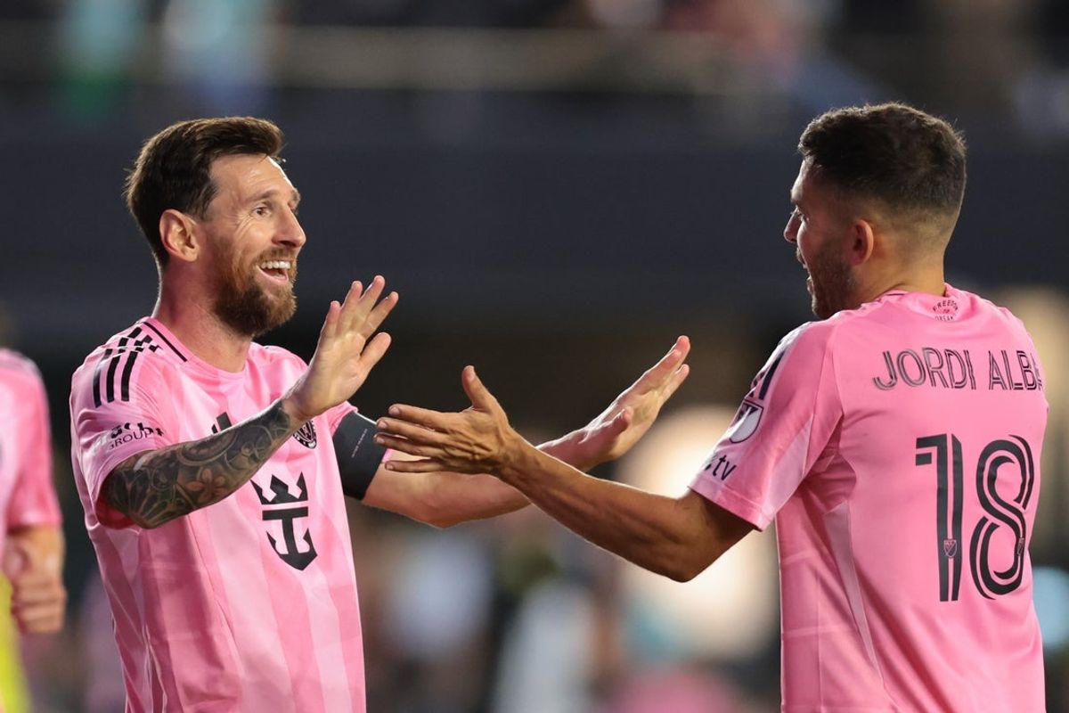 Oct 24, 2025; Fort Lauderdale, Florida, USA; Inter Miami CF forward Lionel Messi (10) celebrates with defender Jordi Alba (18) after scoring against Nashville SC during the second half at Chase Stadium. Mandatory Credit: Sam Navarro-Imagn Images