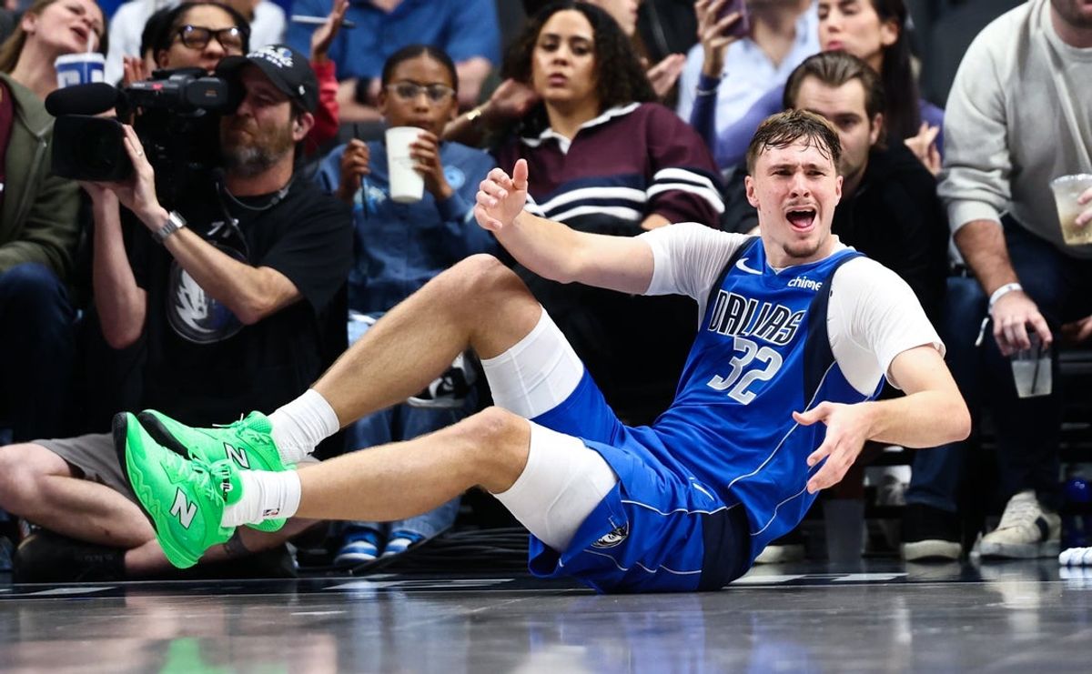 Oct 24, 2025; Dallas, Texas, USA;  Dallas Mavericks forward Cooper Flagg (32) reacts during the second half against the Washington Wizards at American Airlines Center. Mandatory Credit: Kevin Jairaj-Imagn Images