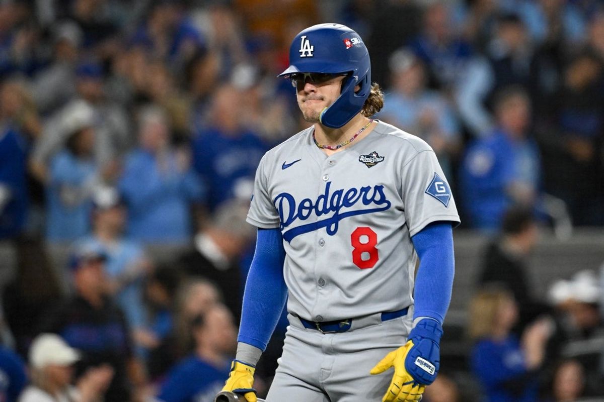 Oct 24, 2025; Toronto, Ontario, CAN; Los Angeles Dodgers left fielder Enrique Hernandez (8) reacts to strking out against the Toronto Blue Jays in the sixth inning during game one of the 2025 MLB World Series at Rogers Centre. Mandatory Credit: Dan Hamilton-Imagn Images