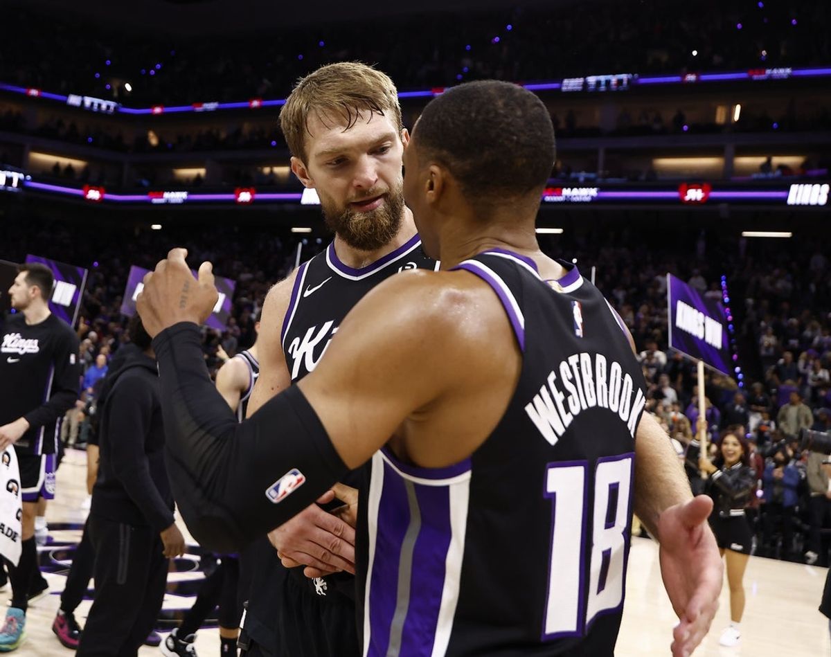 Oct 24, 2025; Sacramento, California, USA; Sacramento Kings center Domantas Sabonis (11) and guard Russell Westbrook (18) celebrate after the game against the Utah Jazz during the fourth quarter at Golden 1 Center. Mandatory Credit: Kelley L Cox-Imagn Images