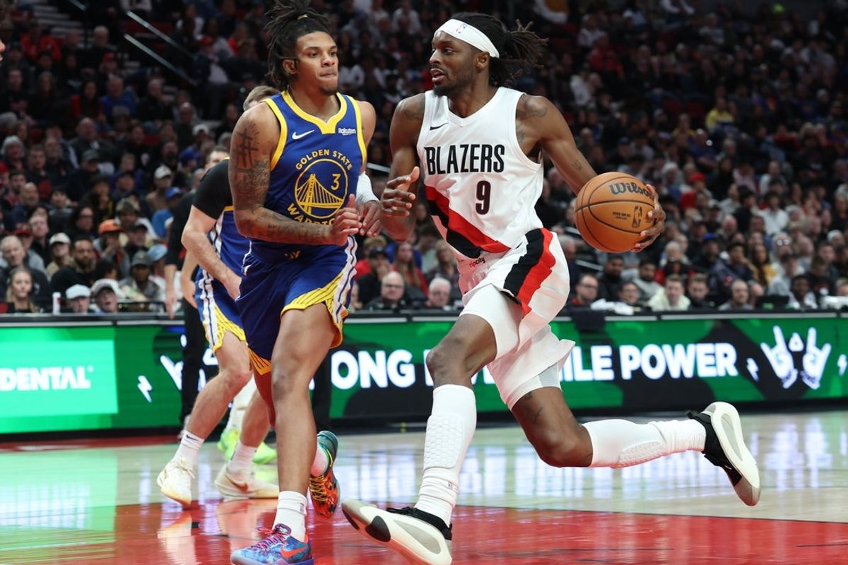 Oct 24, 2025; Portland, Oregon, USA;  Portland Trail Blazers forward Jerami Grant (9) drives to the basket against Golden State Warriors guard Will Richard (3) in the second half at Moda Center. Mandatory Credit: Jaime Valdez-Imagn Images