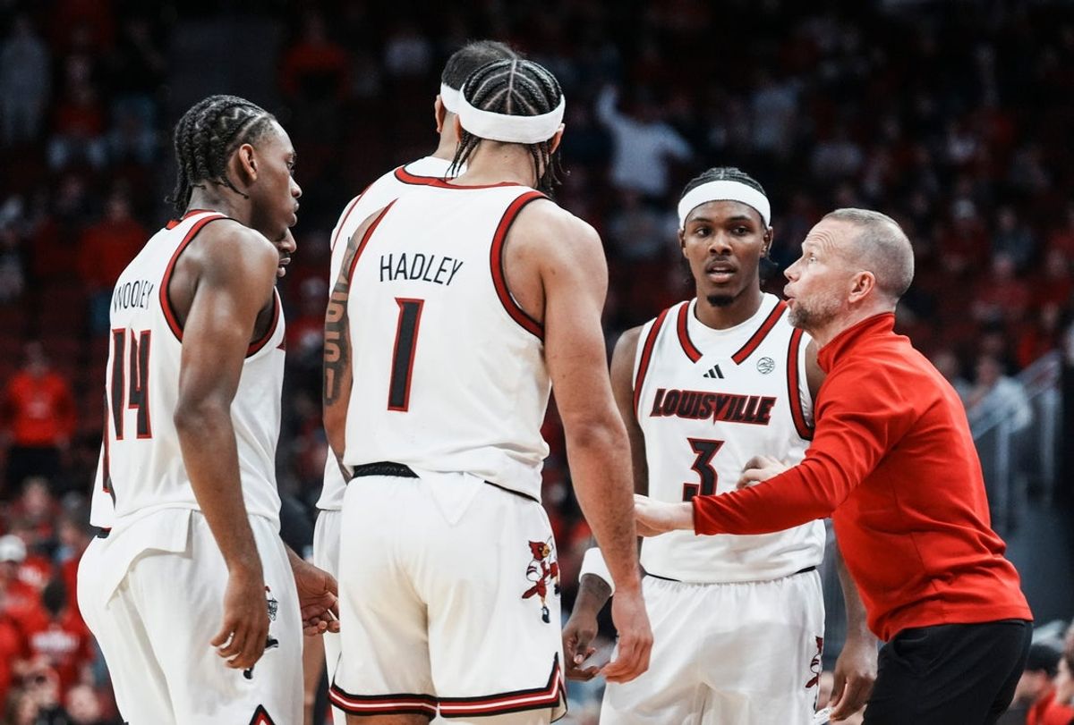 Louisville Cardinals men's basketball coach Pat Kelsey talks to his team during the exhibition game against Kansas at the KFC Yum! Center in Louisville, Kentucky Friday, October 24, 2025.