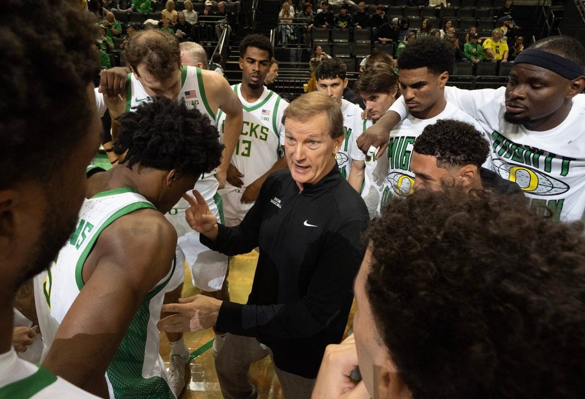 Oregon men's basketball coach Dana Altman gives his team some last second instructions before their exhibition game against Utah at Matthew Knight Arena Oct. 24, 2025.