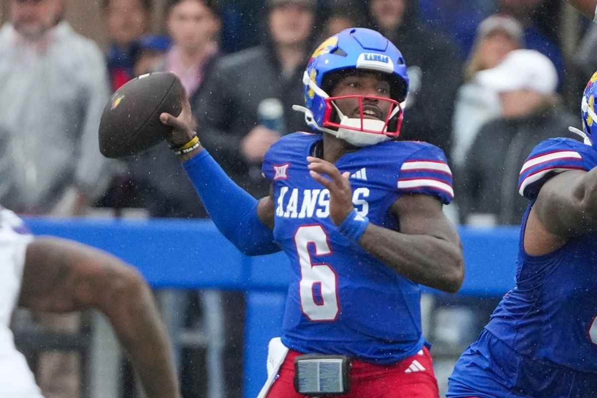 Oct 25, 2025; Lawrence, Kansas, USA; Kansas Jayhawks quarterback Jalon Daniels (6) throws a pass against the Kansas State Wildcats during the first half of the game at David Booth Kansas Memorial Stadium. Mandatory Credit: Denny Medley-Imagn Images