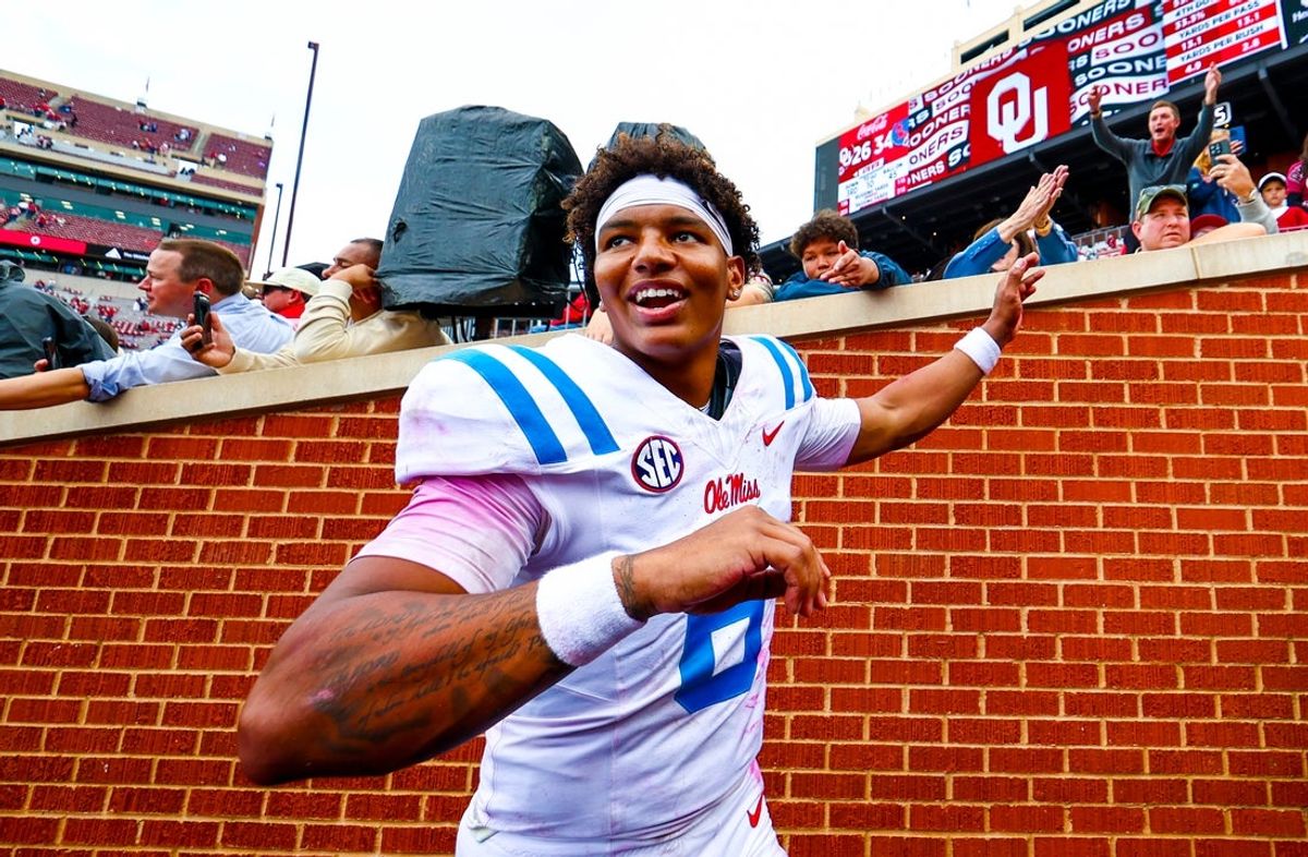 Oct 25, 2025; Norman, Oklahoma, USA;  Ole Miss Rebels quarterback Trinidad Chambliss (6) celebrates with fans after the game against the Oklahoma Sooners at Gaylord Family-Oklahoma Memorial Stadium. Mandatory Credit: Kevin Jairaj-Imagn Images