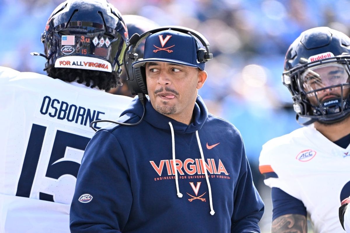 Oct 25, 2025; Chapel Hill, North Carolina, USA;  Virginia Cavaliers head coach Tony Elliott on the field in the first quarter at Kenan Stadium. Mandatory Credit: Bob Donnan-Imagn Images