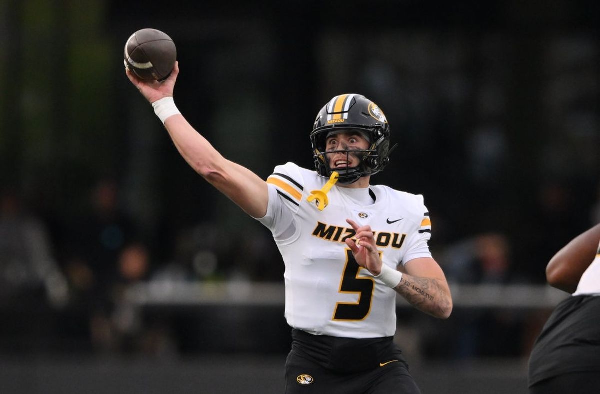 Oct 25, 2025; Nashville, Tennessee, USA; Missouri Tigers quarterback Beau Pribula (9) passes during the third quarter against the Vanderbilt Commodores at FirstBank Stadium. Mandatory Credit: Steve Roberts-Imagn Images